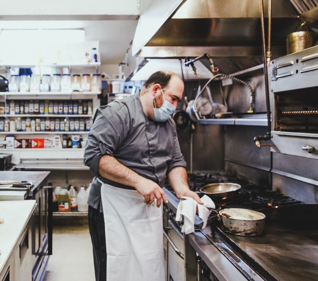 Chef de Cuisine, Jason Azevedo, Little River Inn working in kitchen