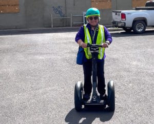 Pisces JDP rides a segway in Flagstaff