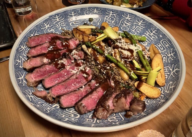 American Wagyu beef on a platter served at Tinderbox Kitchen in Flagstaff, Arizona.